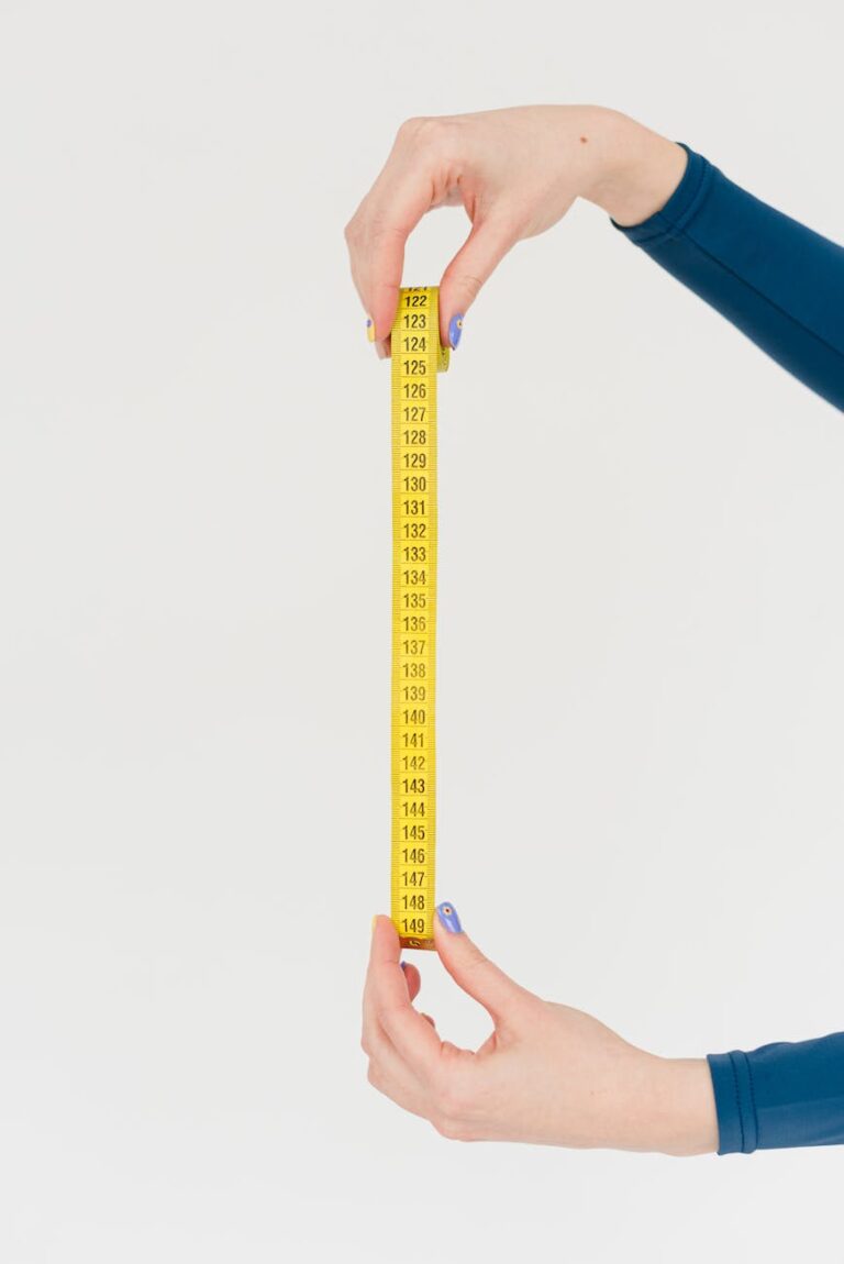 woman showing measuring tape for checking body forms