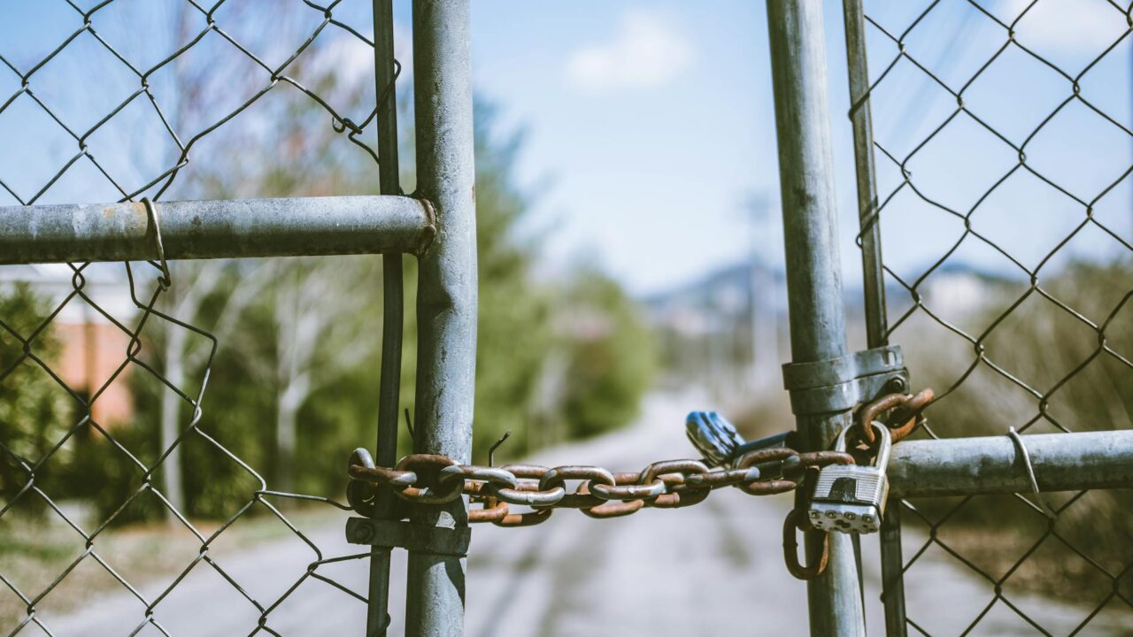 cyclone fence in shallow photography