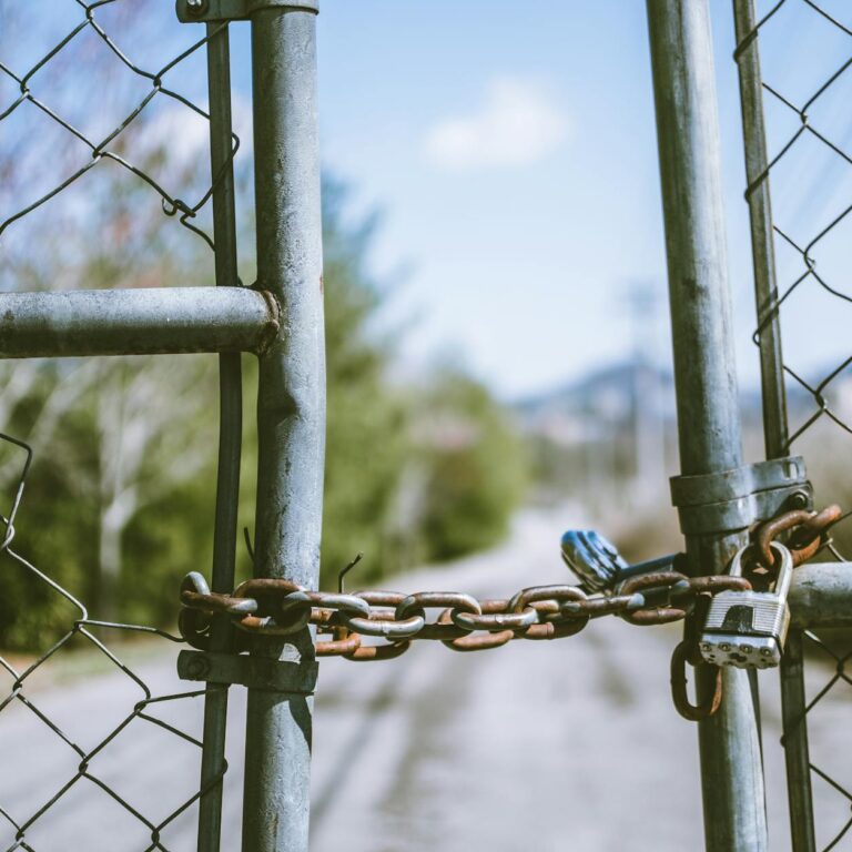 cyclone fence in shallow photography